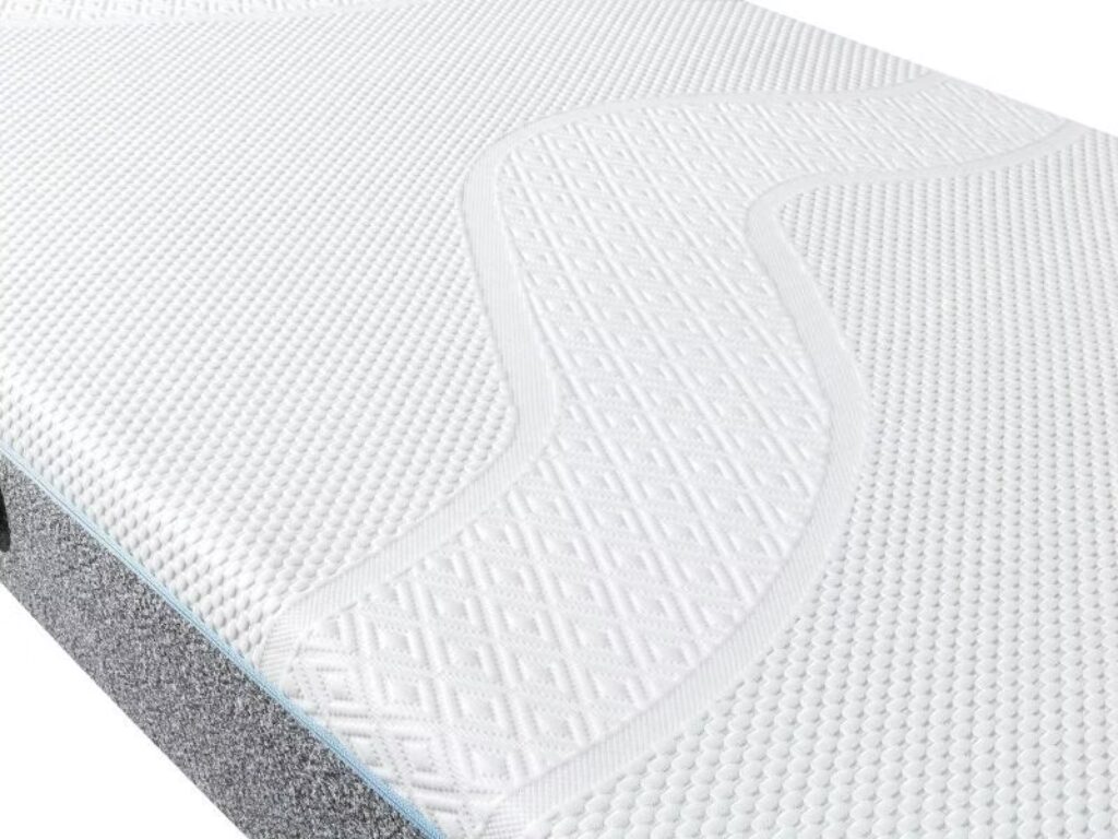 Witte matras met een golvend patroon.